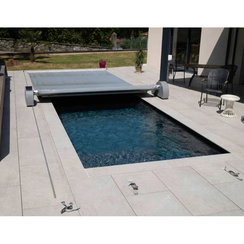 Slatted cover with solar roller for swimming pools